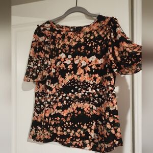 Black blouse with red and white flowers